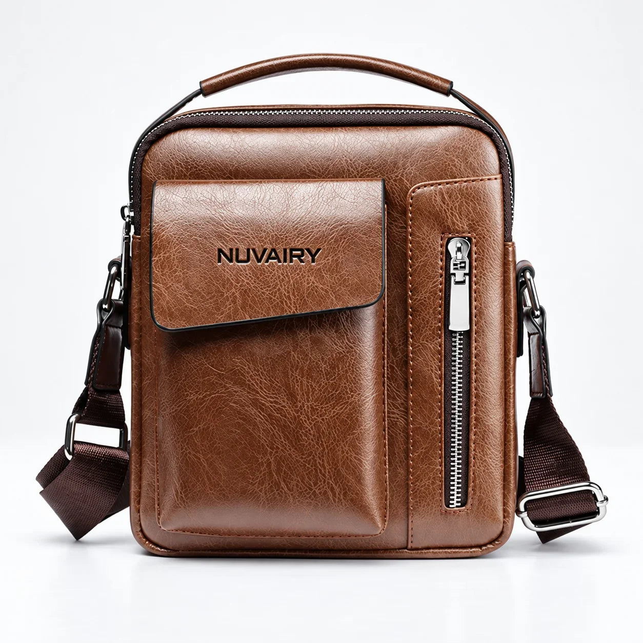 Bolsa masculina transversal Nuvairy em couro marrom com bolso frontal, alça ajustável e detalhes em zíper.