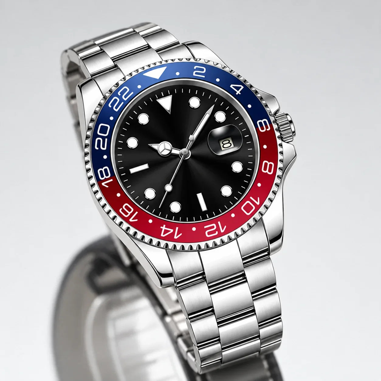 Relógio masculino Nuvairy em aço inoxidável, pulseira metálica, bisel azul e vermelho estilo GMT e mostrador preto com visor de data.